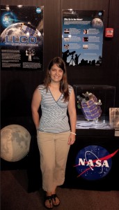 Our LADEE Orbit Determination lead, Lisa Policastri, visited the NASA Wallops Flight Facility prior to launch.  She is standing here in front of the LADEE display, and you can see the LLCD display on the left.
